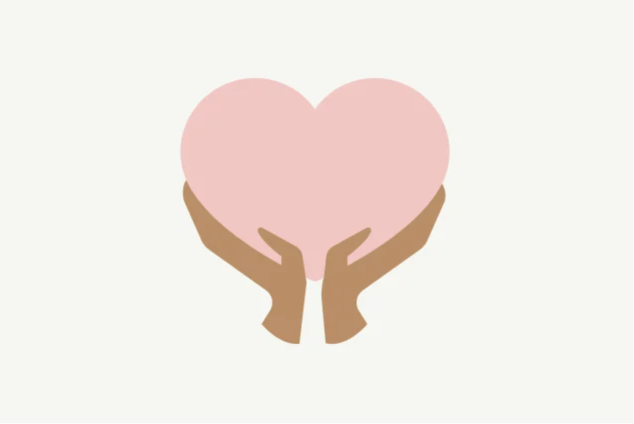 A graphic of two brown hands holding a light pink heart.