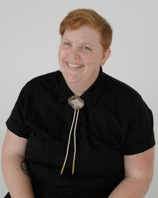 headshot of ainsley