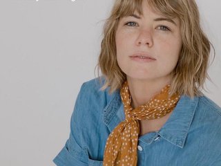 A white woman with short brown hair looking at the camera with the text LOVE PARTIES With Amy Shack Egan written on the top left corner