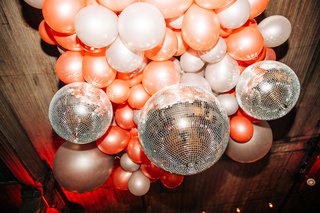 Pink and silver balloons and disco balls